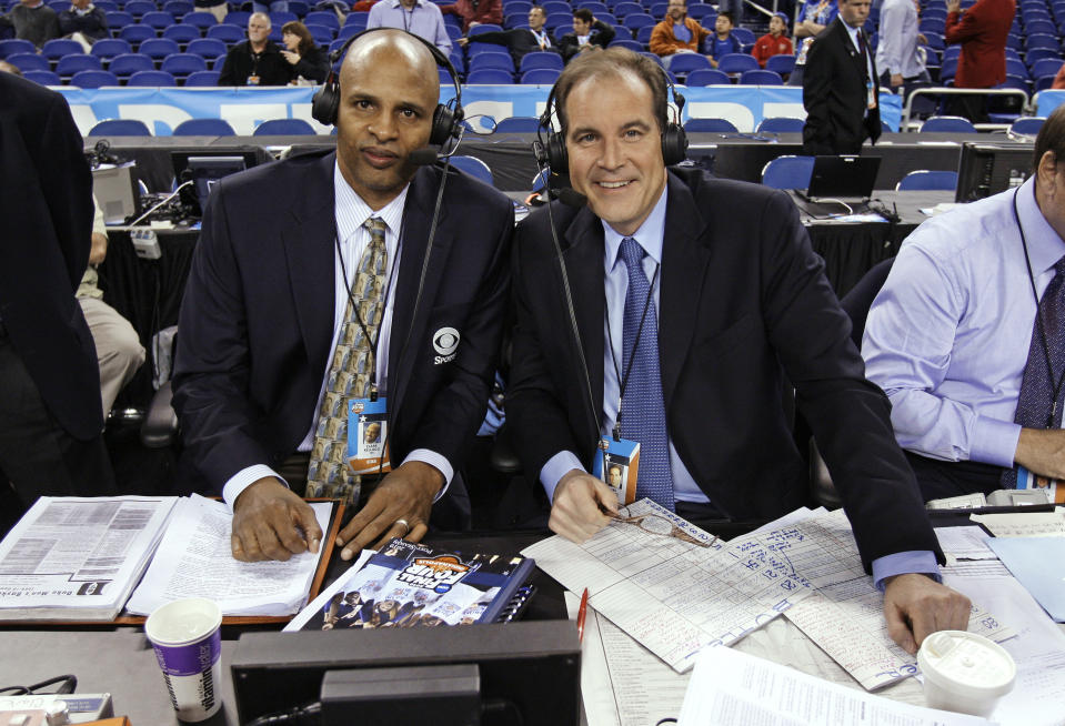 FILE - In this Monday, April 5, 2010, file photo, CBS sportscasters Clark Kellogg, left, and Jim Nantz are seen before the men's NCAA Final Four college basketball championship game between Butler and Duke, in Indianapolis. Nantz is home in California in the early spring of 2020 because of the new coronavirus pandemic, after spending the last 34 years at the Final Four and Masters. (AP Photo/Michael Conroy, File)