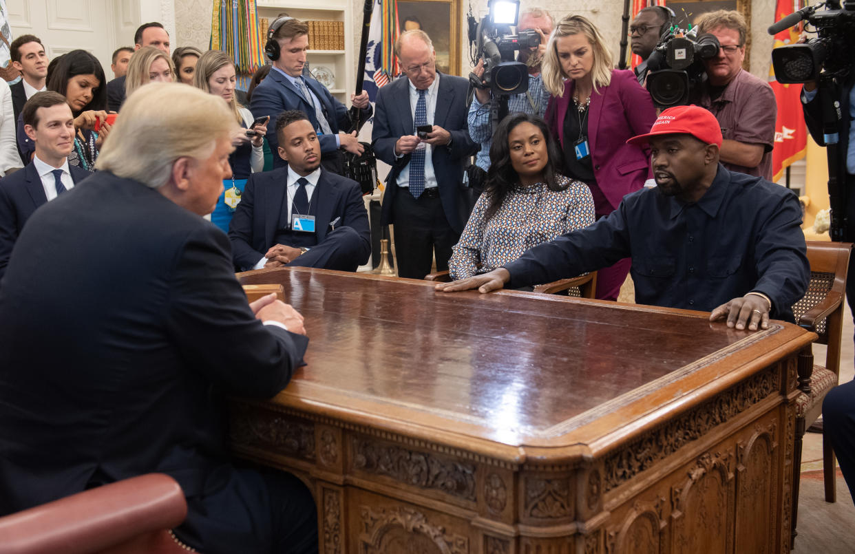 Donald Trump with rapper Kanye West in the Oval Office, on Oct. 11, 2018. (Saul Loeb via Getty Images/AFP) 