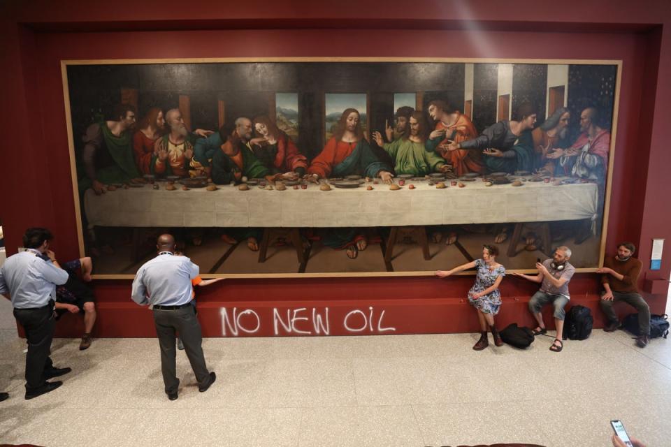 Members of the group glued themselves to a copy of ‘The Last Supper’ by Giampietrino at London’s Royal Academy (James Manning/PA) (PA Wire)