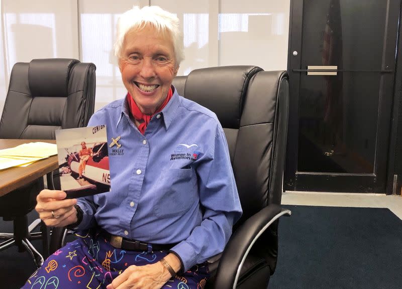 FILE PHOTO: Wally Funk, a Virgin Galactic ticketholder and one of the First Lady Astronaut Trainees or ‘Mercury 13’ women, is pictured holding a photo of herself at the International Women’s Air and Space Museum in Cleveland