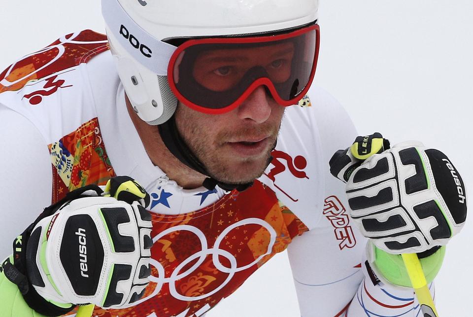 United States' Bode Miller pauses in the finish area after completing Men's super combined downhill training at the Sochi 2014 Winter Olympics, Tuesday, Feb. 11, 2014, in Krasnaya Polyana, Russia. (AP Photo/Christophe Ena)