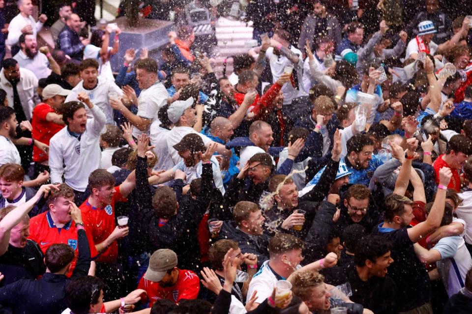 England fans celebrate the first goal in the 6-2 win at Wembley Boxpark (Action Images via Reuters)