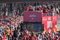 Kansas City Chiefs chairman and CEO Clark Hunt holds the Vince Lombardi Trophy as their bus arrives at the victory rally in Kansas City, Mo., Wednesday, Feb. 14, 2024. The Chiefs defeated the San Francisco 49ers Sunday in the NFL Super Bowl 58 football game. (AP Photo/Reed Hoffmann)