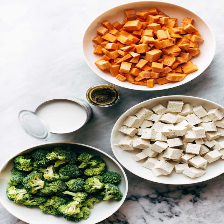 Sweet potato, broccoli, tofu, coconut milk, and green curry paste.