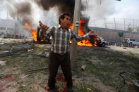 <p>An Afghan man reacts at the site of a blast in Kabul, Afghanistan May 31, 2017. (Omar Sobhani/Reuters) </p>