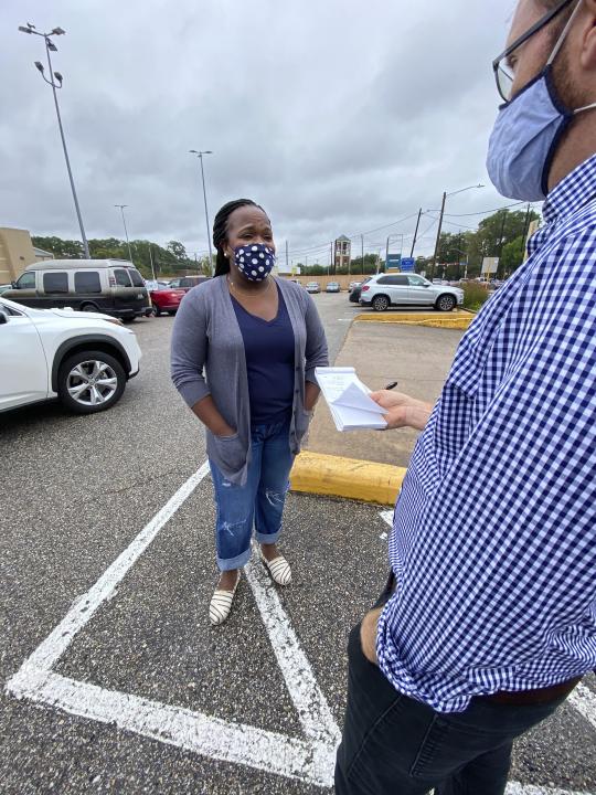 Akilah Bacy, a Houston lawyer and candidate for Texas state house district 138, speaks with the Associated Press outside of a voting center in the Spring Branch neighborhood, Friday Oct. 16, 2020 in Houston. Bacy, a Democrat, is vying for an open seat in what could be a closely contested district. Texas Democrats hope to regain control of the state house after decades out of power. (AP Photo/John L. Mone)