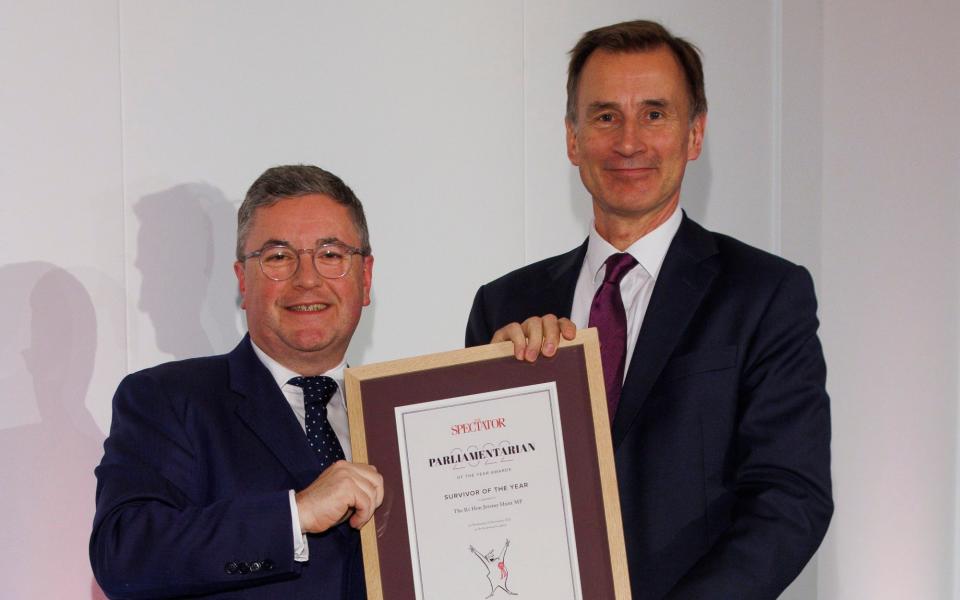 Jeremy Hunt with Sir Robert Buckland after winning the survivor of the year award - Jamie Lorriman