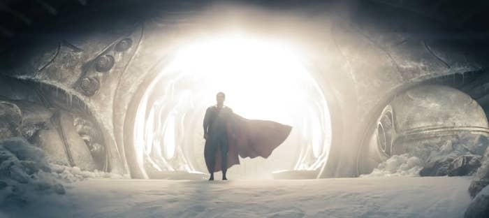 Superman emerging from the Kryptonian Scout Ship in his red and blue suit in "Man of Steel"