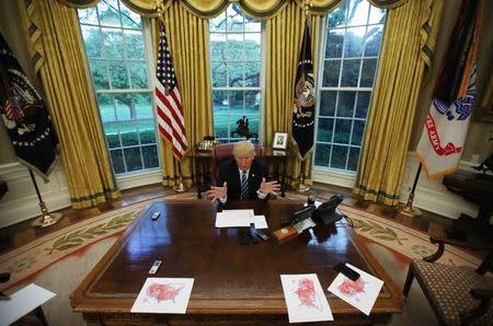 U.S. President Donald Trump speaks during an interview with Reuters in the Oval Office of the White House in Washington, U.S., April 27, 2017. REUTERS/Carlos Barria