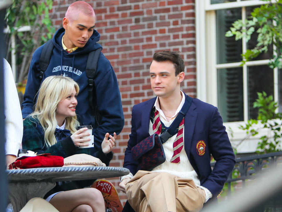 Thomas Doherty, Emily Alyn Lind and Evan Mock are seen at the film set of the 'Gossip Girl' TV Series on March 11, 2021 in New York City