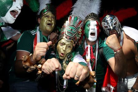 Soccer Football - World Cup - Group F - Germany vs Mexico - Luzhniki Stadium, Moscow, Russia - June 17, 2018 Mexico fans wearing headdresses before the match REUTERS/Carl Recine