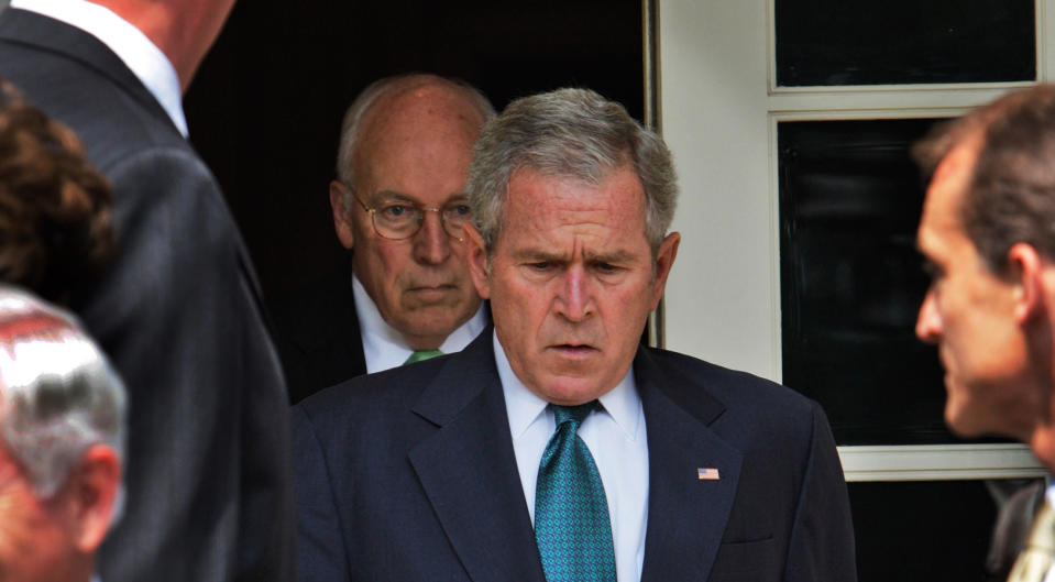 This July 30, 2008 file photo shows President Bush, followed by Vice President Dick Cheney, as he leaves the Cabinet Room of the White House in Washington, to make a statement in the Rose Garden following a Cabinet meeting in Washington, D.C. "The World According to Dick Cheney" is included in the documentary premieres at the upcoming 2013 Sundance Film Festival in January. (AP Photo/Ron Edmonds, File)