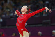 <b>Rebecca Tunney - 15</b><br>Rebecca Tunney of Great Britain reacts after the beam in the Artistic Gymnastics Women's Team qualification on Day 2 of the London 2012 Olympic Games at North Greenwich Arena on July 29, 2012 in London, England. (Photo by Cameron Spencer/Getty Images)