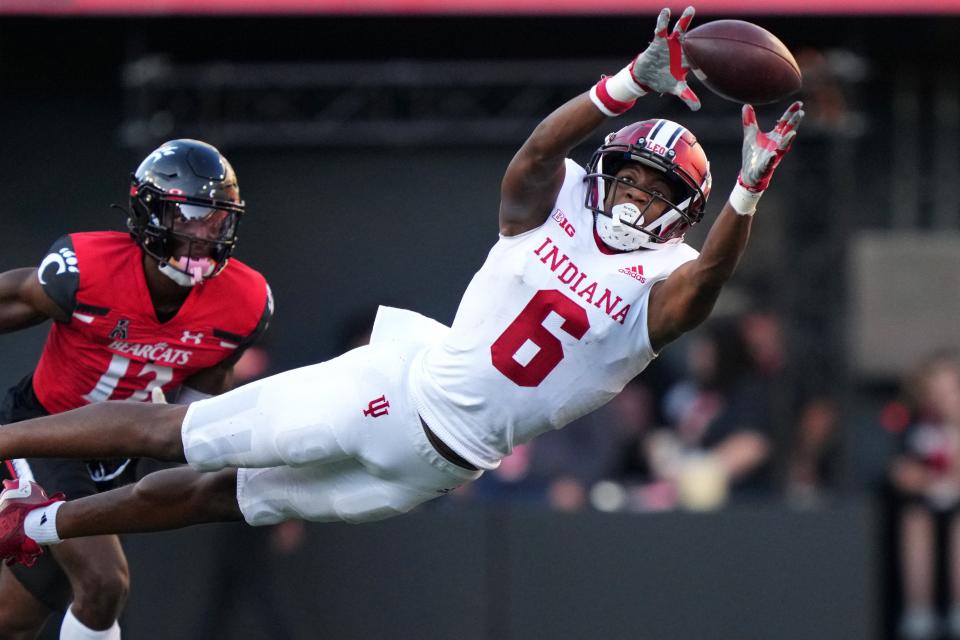 Indiana Hoosiers wide receiver Cam Camper (6) extends to catch a pass in the third quarter of a college football game against the Cincinnati Bearcats, Saturday, Sept. 24, 2022, at Nippert Stadium in Cincinnati. 
