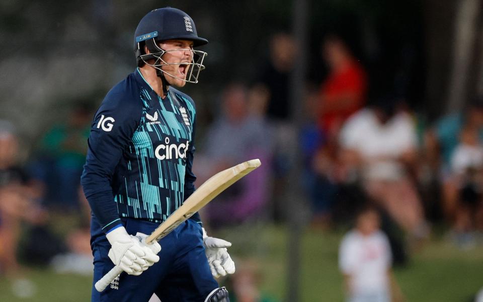 England's Jason Roy celebrates after scoring a century (100 runs) during the first one day international (ODI) cricket match between South Africa and England at Mangaung Oval in Bloemfontein - Marco Longari/AFP via Getty Images)