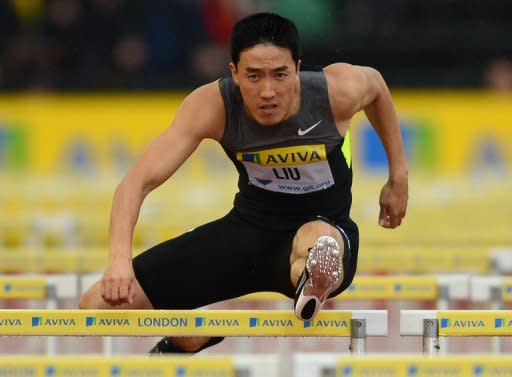 China's Liu Xiang competes in the men's 110m hurdles at the 2012 Diamond League meeting at Crystal Palace on July 13. Liu leads a Chinese squad for the forthcoming London Olympics but the pressure is on for them to repeat their success at the 2008 Beijing Olympics when they topped the medals table