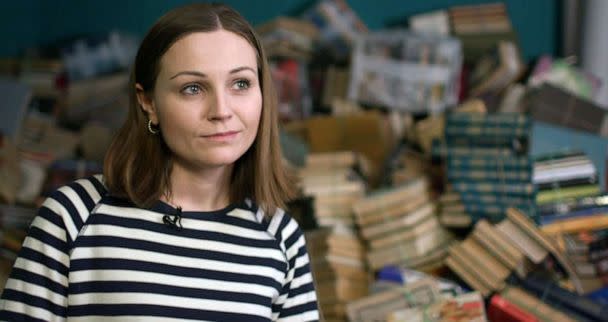 PHOTO: Nadia Kibenko, 32, at the Syayvo bookstore in Kyiv, where Russian language books are taken to be recycled. (ABC News)