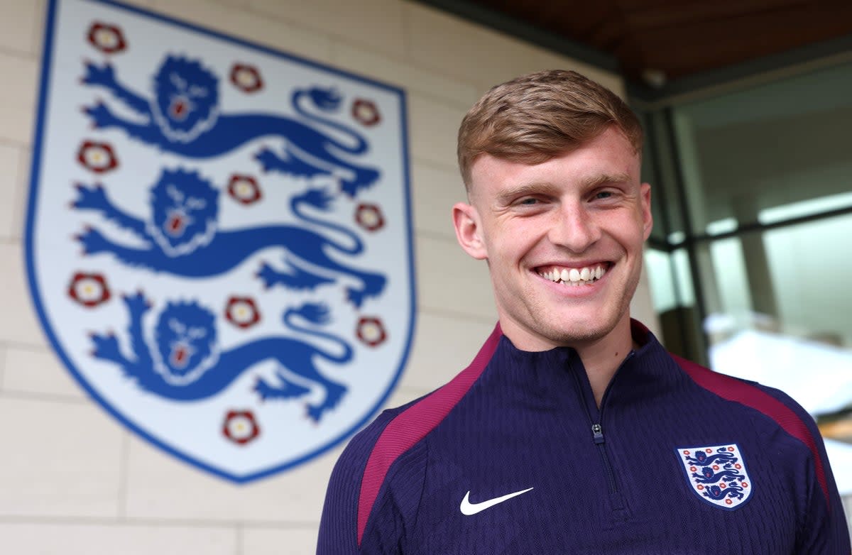 Jarrad Branthwaite poses beside the Three Lions at St George’s Park (The FA via Getty Images)