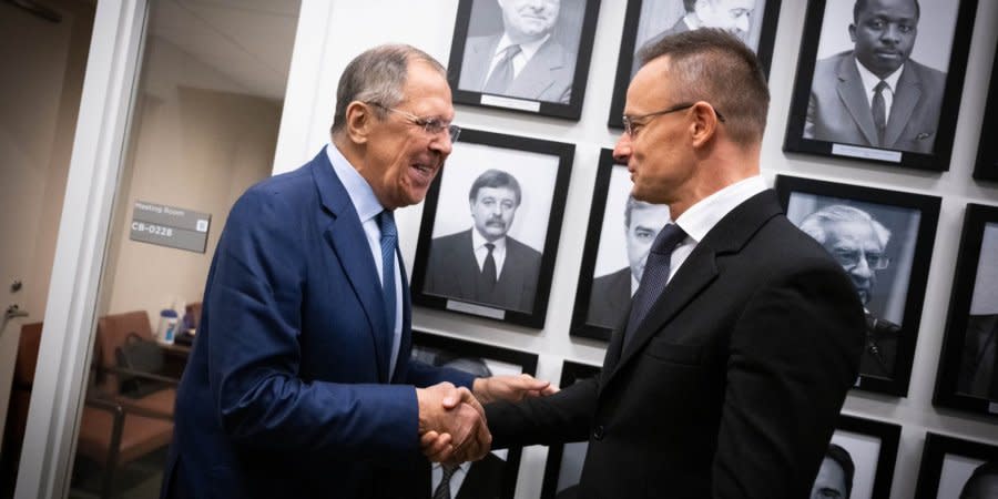 Lavrov and Szijjarto shake hands