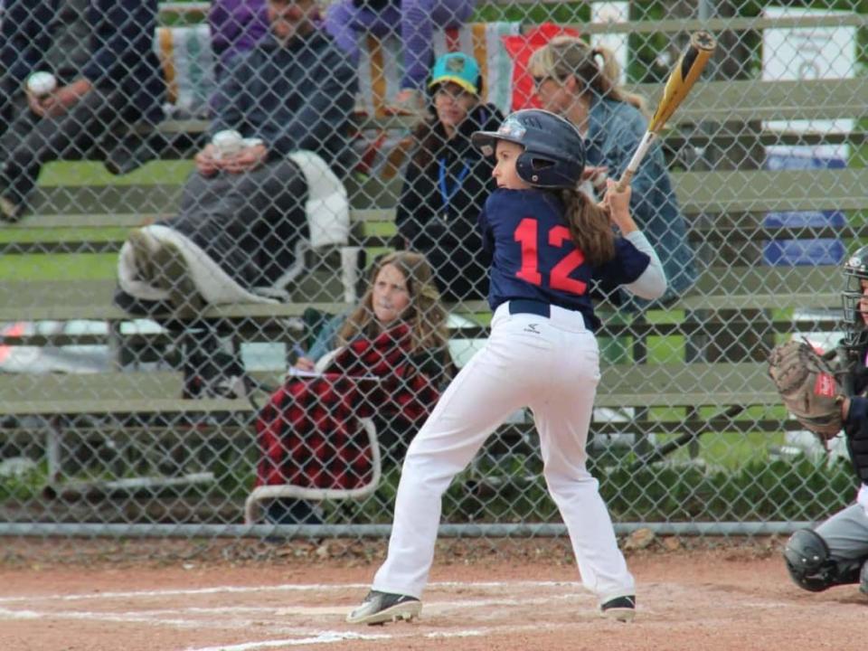 Carter Stewart stands at bat while playing in Calgary West Little League.  (Submitted by Todd Stewart - image credit)