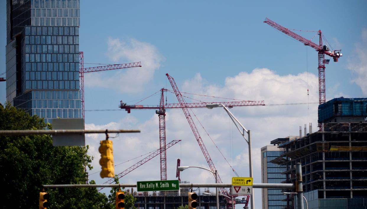 Construction cranes crowd the Nashville skyline as more development continues downtown.