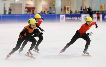 (L to R) Malaysia's Wong De-vin, Indonesia's Johanes Wihardja and Singapore's Lucas Ng Jun Jie compete in the Mens 1000m Final during the Tri-Series South East Asia Cup in Singapore February 21, 2016. REUTERS/Jeremy Lee