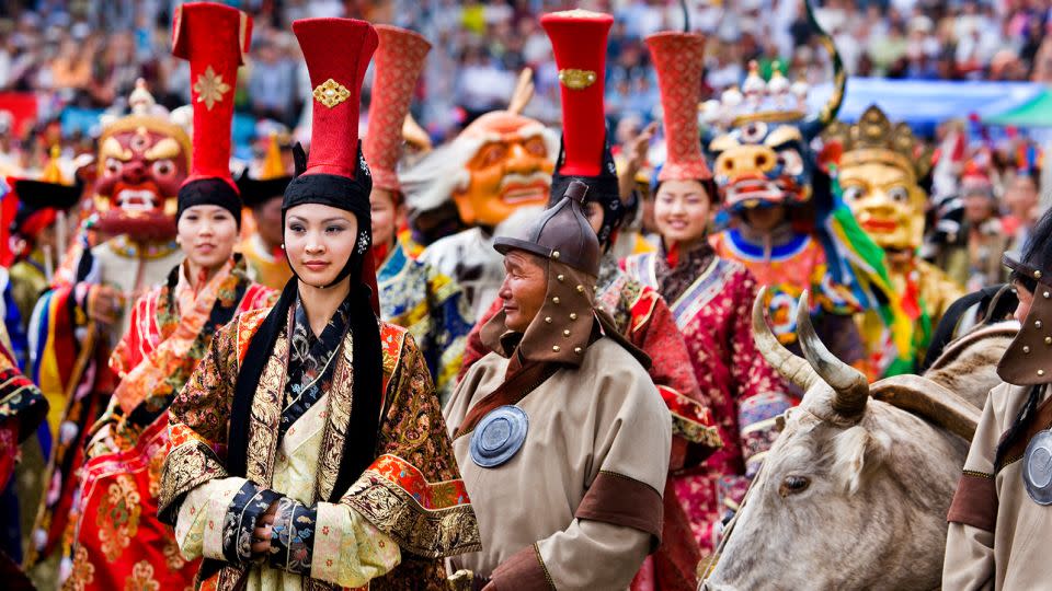 A Genghis Khan actor takes center stage during the Naadam opening ceremony at Ulaanbaatar's National Stadium in 2006. - Barry Lewis/Corbis/Getty Images