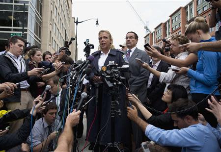 Cathy Lanier, chief of police of Washington, DC, and Vincent Gray, mayor of Washington, DC, speak during a news conference as police respond to a shooting at the Washington Navy Yard in Washington September 16, 2013. REUTERS/Joshua Roberts