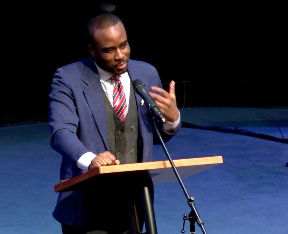 Sayreville Councilman Christian Onuoha speaks during the memorial service for slain Councilwoman Eunice Dwumfour at the Epic Church International in the town Wednesday evening, February 8, 2023.  