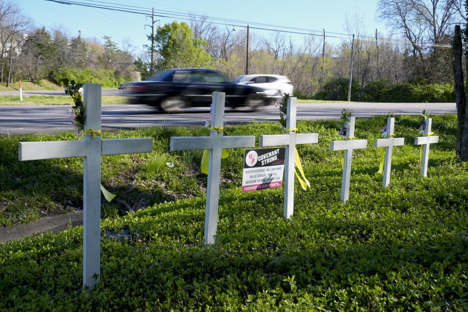 A roadside memorial is seen near the Covenant School on the one-year anniversary of a mass shooting Wednesday, March 27, 2024, in Nashville, Tenn. The shooter, a former Covenant School student, killed three children and three staff members during the incident. (AP Photo/George Walker IV)