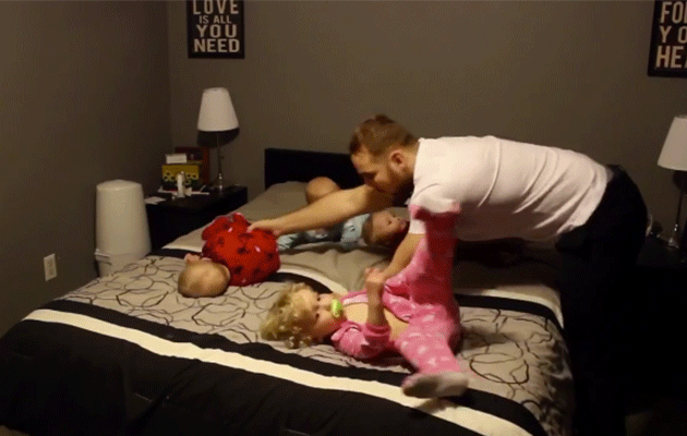 Dad dresses toddler and triplets like pro. Photo: YouTube