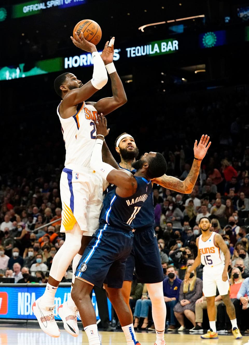 Nov 17, 2021; Phoenix, Arizona, USA; Phoenix Suns center Deandre Ayton (22) takes a shot over Dallas Mavericks forward Tim Hardaway Jr. (11) at Footprint Center. Mandatory Credit: Rob Schumacher-Arizona Republic