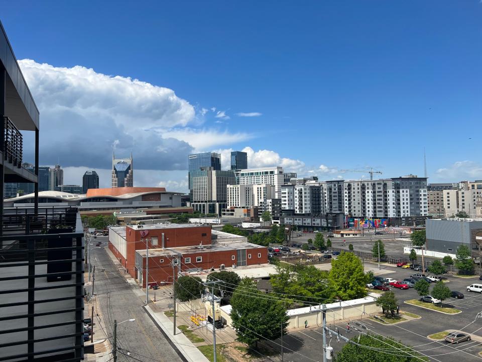 A partial view of Nashville's downtown skyline is visible from the spacious balconies at Hyve, a newly-constructed apartment building in Pie Town. Hyve was featured in the Nashville Downtown Partnership 2023 home tour.