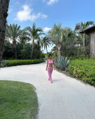 Kim Kardashian Shares Snaps of Hot Pink Beach Attire, Including