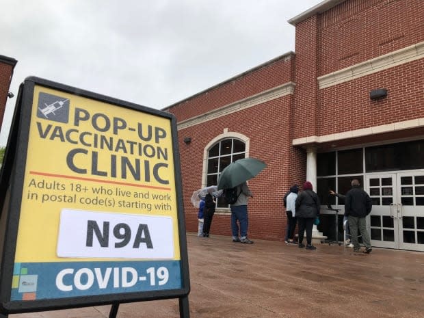 The Windsor-Essex County Health Unit hosted a pop-up vaccination clinic for residents with postal codes starting with N9A on Monday. A second clinic is taking place in Sandwich Towne for N9C residents. (Chris Ensing/CBC - image credit)