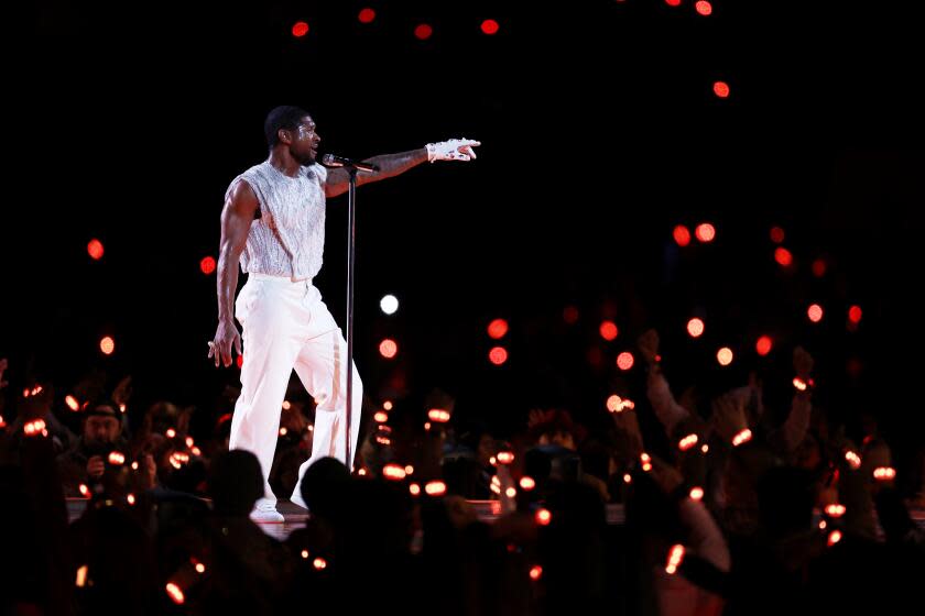 LAS VEGAS, NEVADA - FEBRUARY 11: Usher performs onstage during the Apple Music Super Bowl LVIII Halftime Show at Allegiant Stadium on February 11, 2024 in Las Vegas, Nevada. (Photo by Harry How/Getty Images)