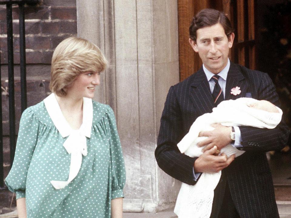 Princess Diana and Prince Charles with Prince William in 1982.