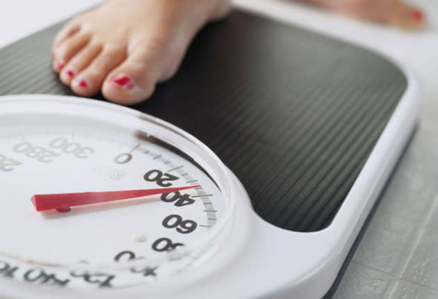 Consider how much weight you should lose. (Getty Images)