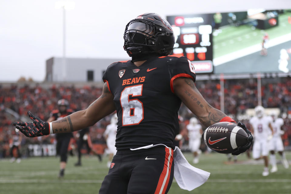 Oregon State running back Damien Martinez (6) celebrates after scoring a touchdown against Stanford during the first half of an NCAA college football game Saturday, Nov. 11, 2023, in Corvallis, Ore. (AP Photo/Amanda Loman)