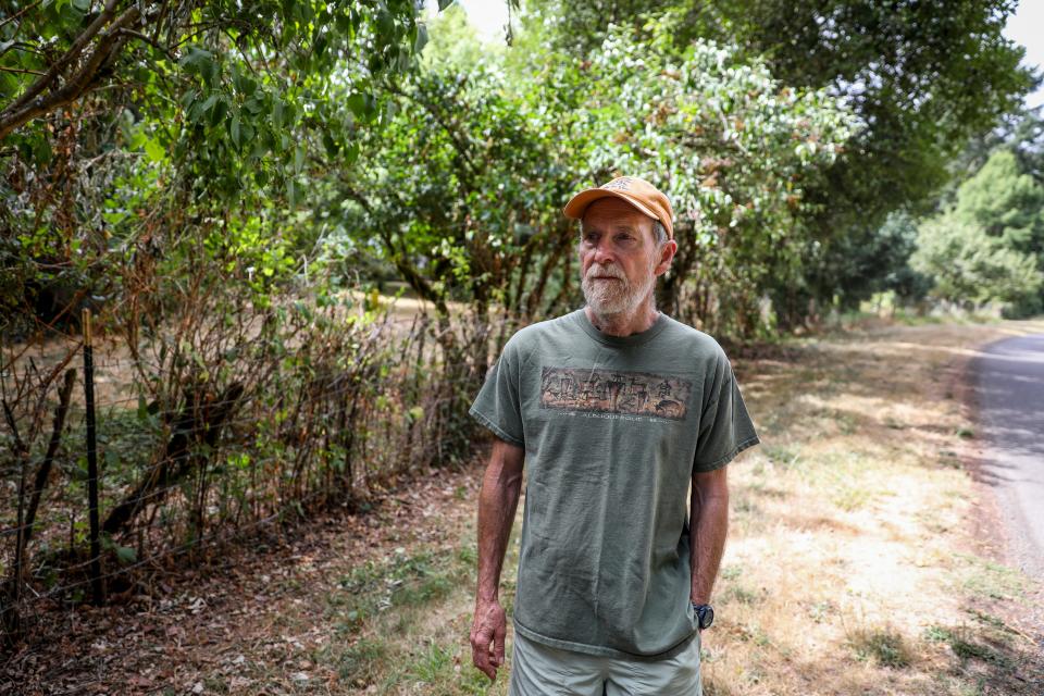 Ron Miner lives in an area vulnerable to wildfires in the hills of South Salem.