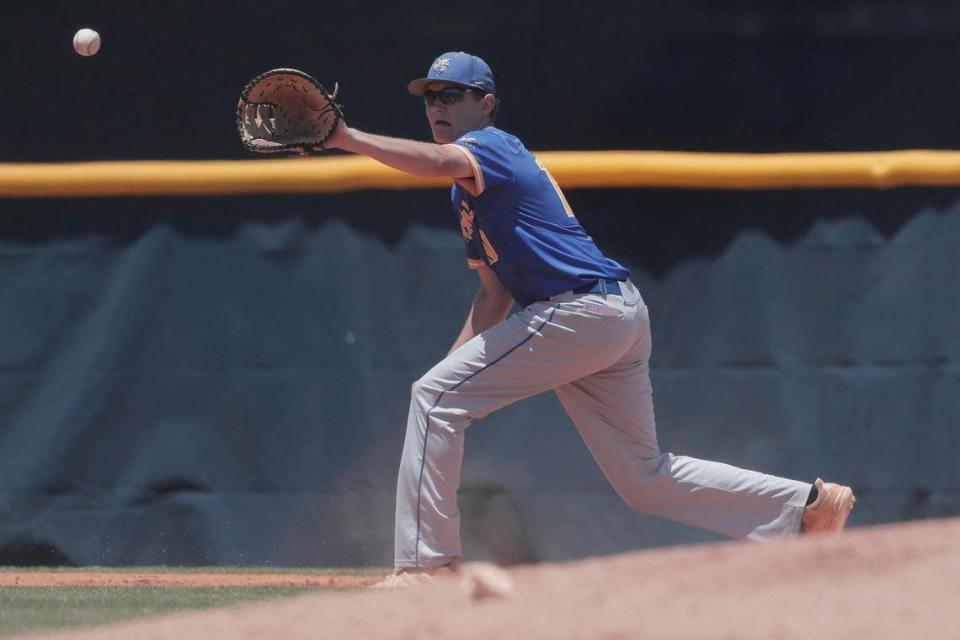 Fort Mill’s Luke Garabedian 10 catches the ball in the Class 5A South Carolina baseball state championship on Saturday, May 28, 2022.