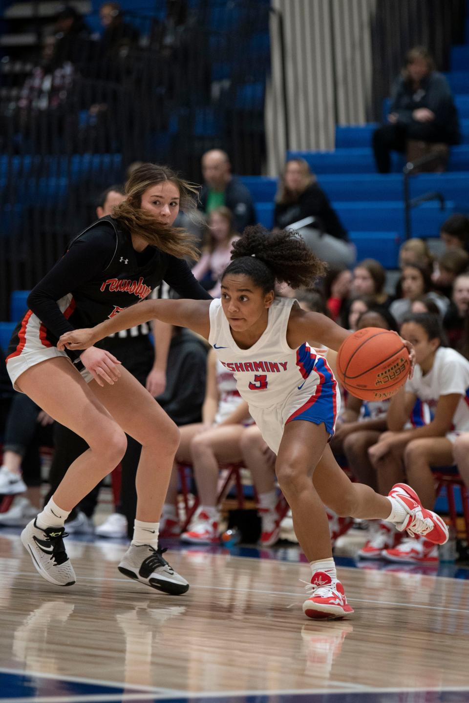 Neshaminy sophomore Alena Cofield makes her way to the hoop through Pennsbury junior Layla Matthias at Neshaminy High School on Tuesday, Jan. 24, 2023. Neshaminy fell to Pennsbury at home after overtime, 31-30.