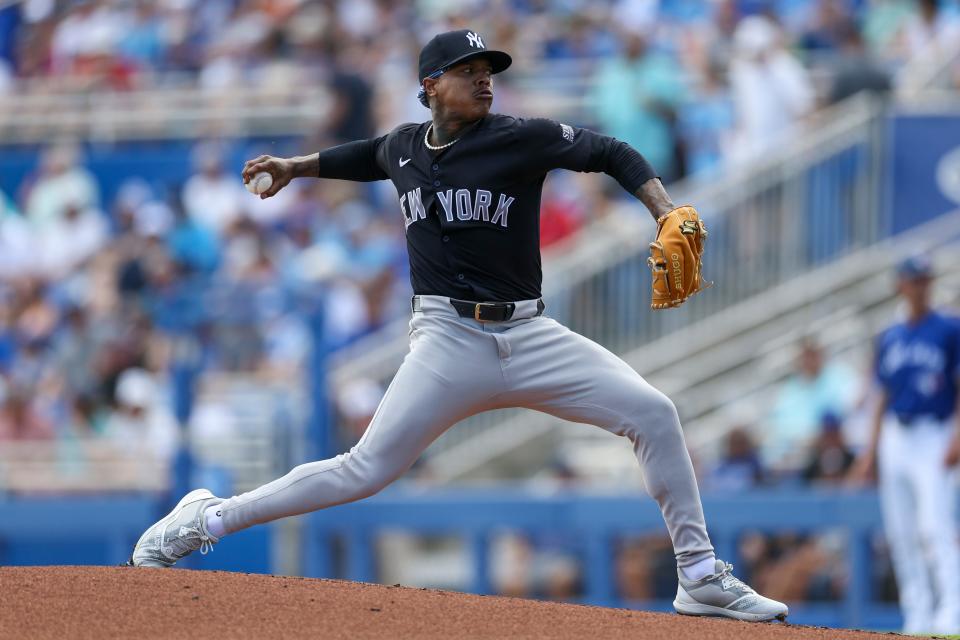 Mar 8, 2024; Dunedin, Florida, USA; New York Yankees starting pitcher Marcus Stroman (0) throws a pitch against the Toronto Blue Jays in the first inning at TD Ballpark. Mandatory Credit: Nathan Ray Seebeck-USA TODAY Sports
