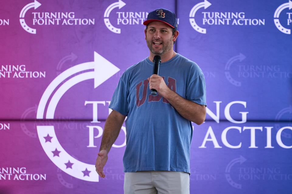 Tyler Bowyer, chief operating officer of Turning Point Action, speaks during the Turning Point Action event at South Mountain Pavilion at Tumbleweed Park in Chandler on Aug. 27, 2022.