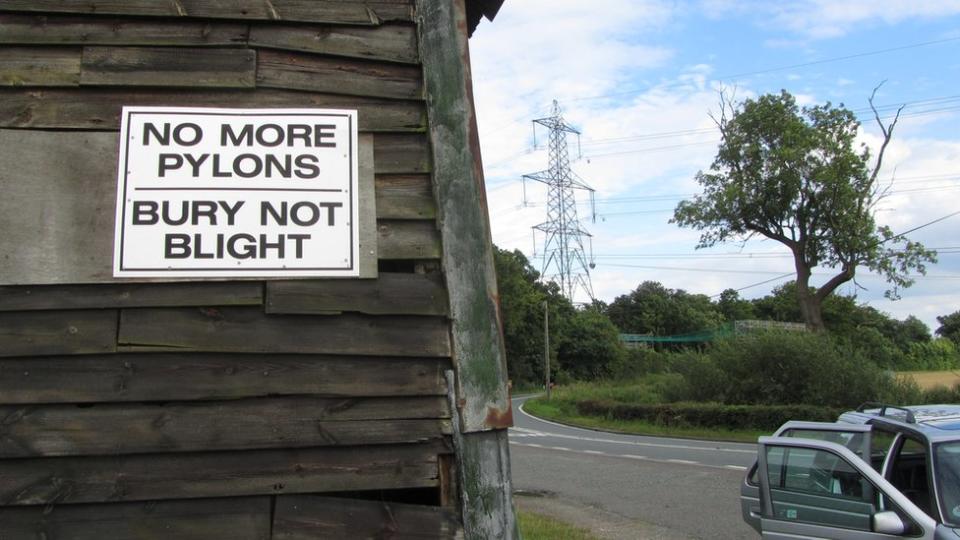 Anti-pylons sign, with a pylon in background
