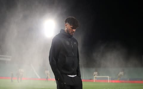 debutant Tyrone Mings gets a feel of the pitch in Sofia pre-match - Credit: Action Images via Reuters/Carl Recine&nbsp;