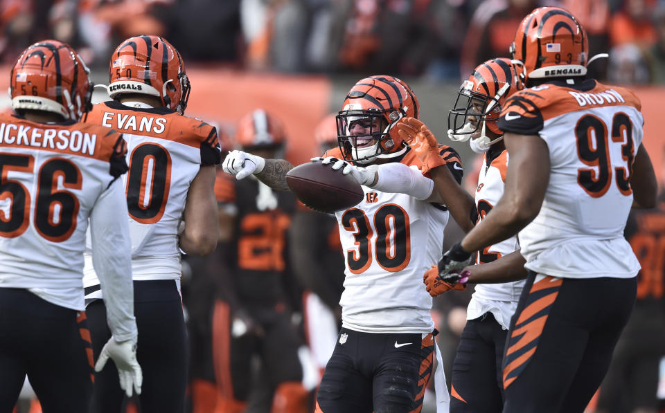 Cincinnati Bengals free safety Jessie Bates (30) celebrates with teammates after an interception during the first half of an NFL football game against the Cleveland Browns, Sunday, Dec. 8, 2019, in Cleveland. (AP Photo/David Richard)