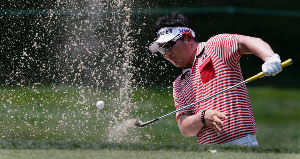 Y.E. Yang of South Korea hits from the bunker on the 13th hole during Round Two of the AT&T National at Congressional Country Club on June 29, 2012 in Bethesda, Maryland. (Photo by Rob Carr/Getty Images)