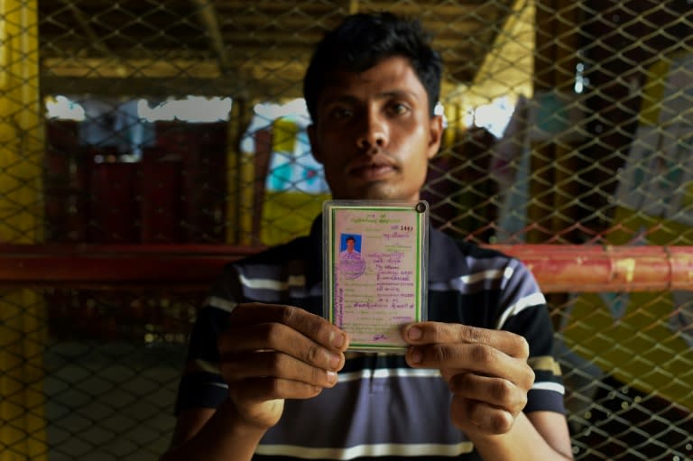 Mohammad Khares with his school ID card. A diligent pupil with dreams of going to university, he was in his final year of high school when violence erupted in his village, forcing him to flee and abandon his studies
