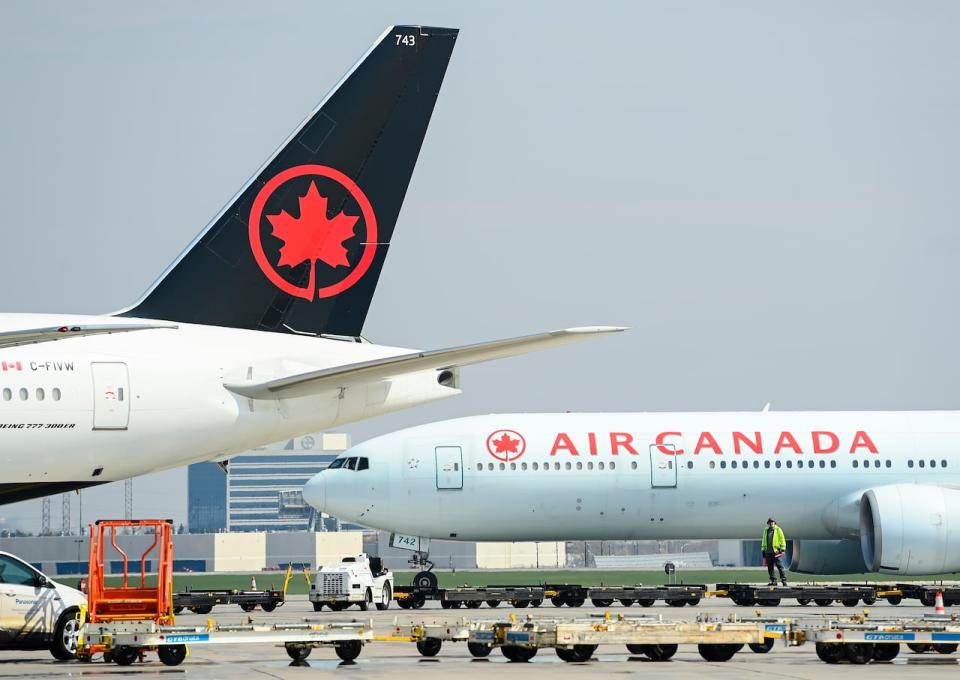 Air Canada planes sit on the tarmac at Pearson International Airport  during the COVID-19 pandemic in Toronto on Wednesday, April 28, 2021. 